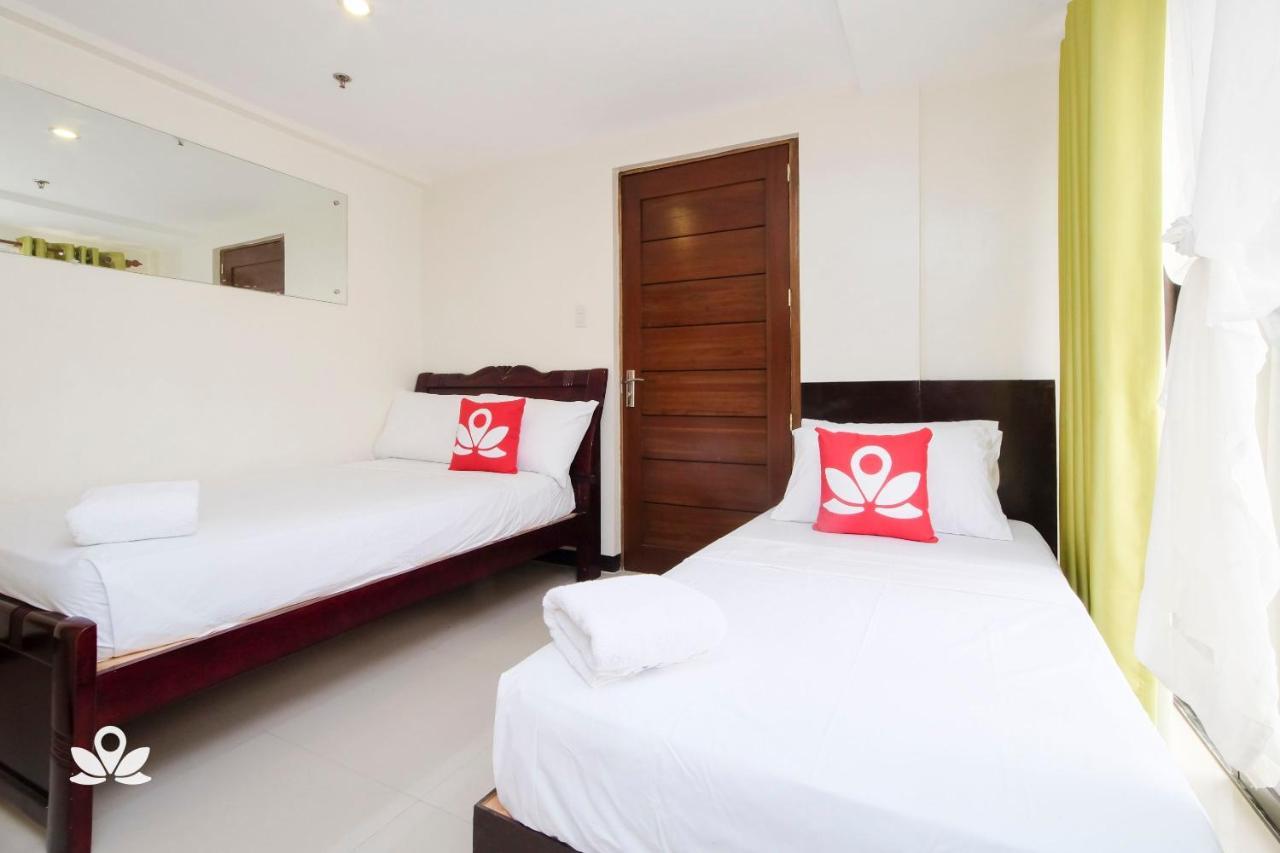 Zen Rooms Time Travellers Makati Макати Экстерьер фото