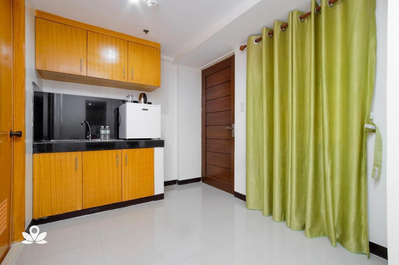 Zen Rooms Time Travellers Makati Макати Экстерьер фото